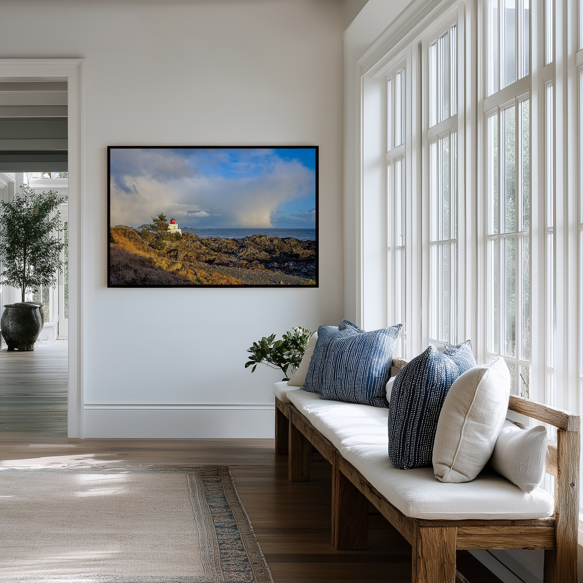 Amphitrite Point Lighthouse Storm Clouds print shown on the wall in an entryway.