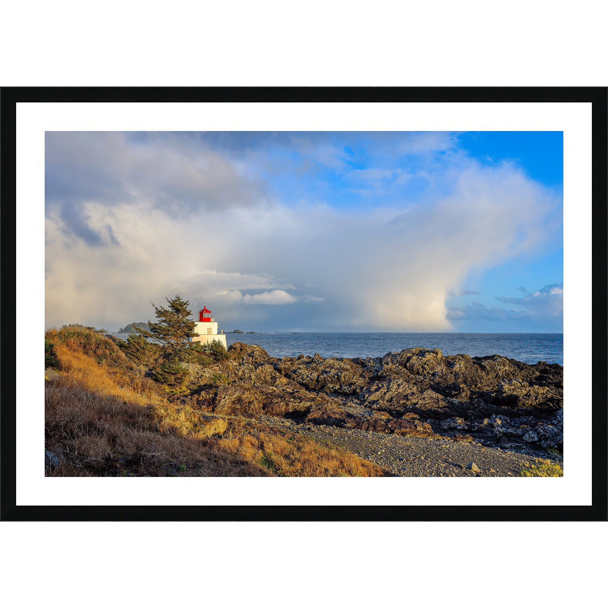 Amphitrite Point Lighthouse Storm Clouds as a framed print.