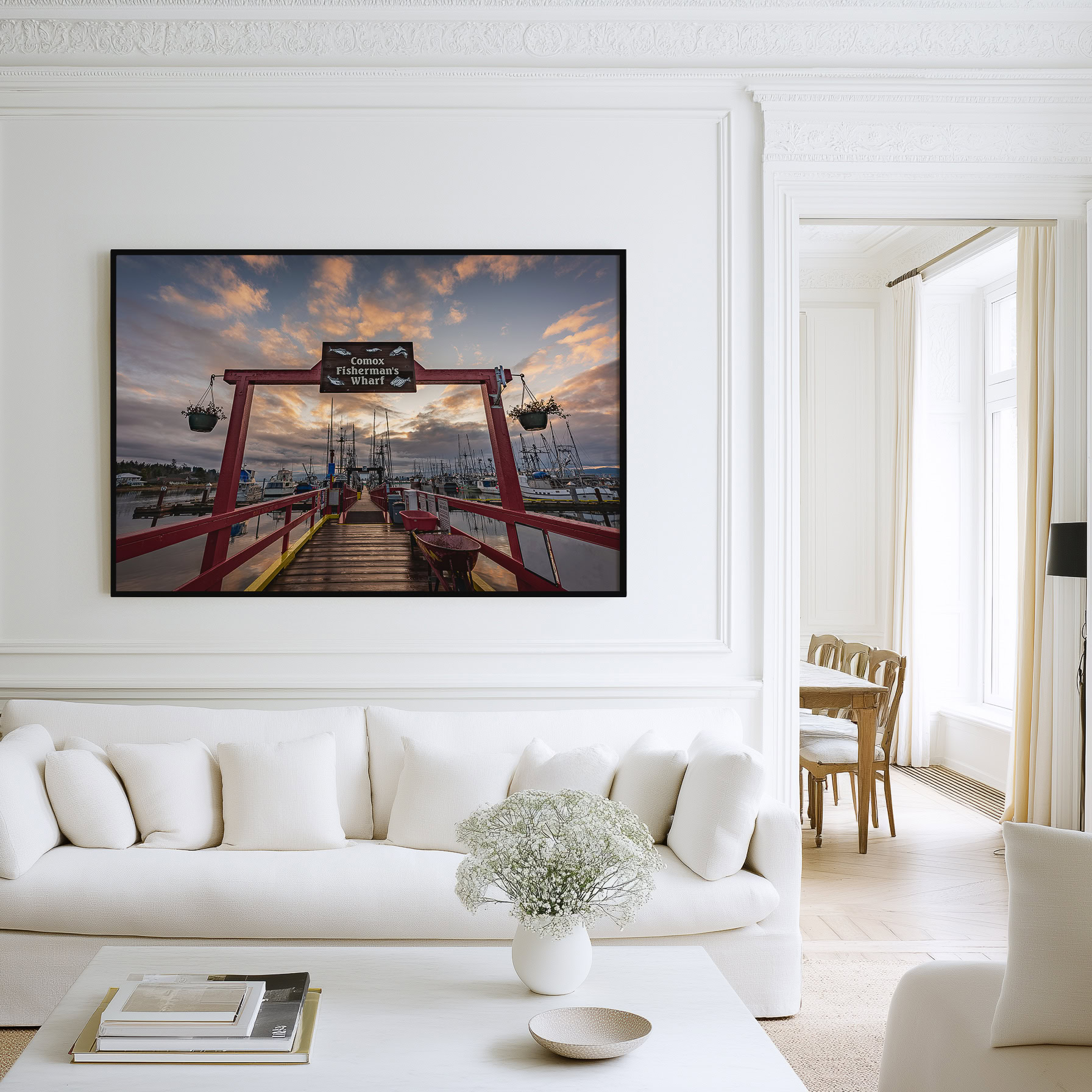 Comox Fisherman's Wharf After the Rain print shown on the wall in a living room.