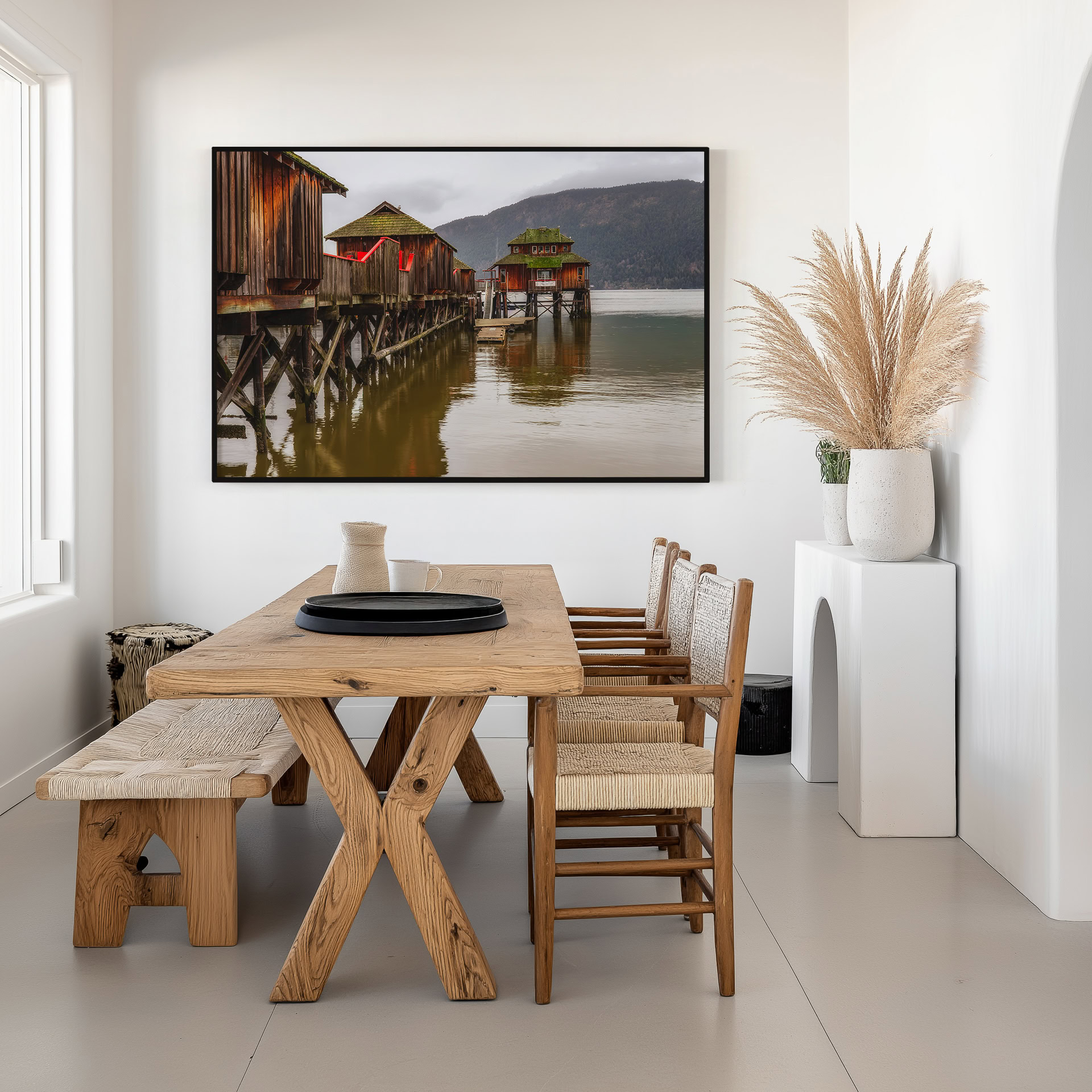 Cowichan Bay Maritime Centre print shown on the wall in a dining room.