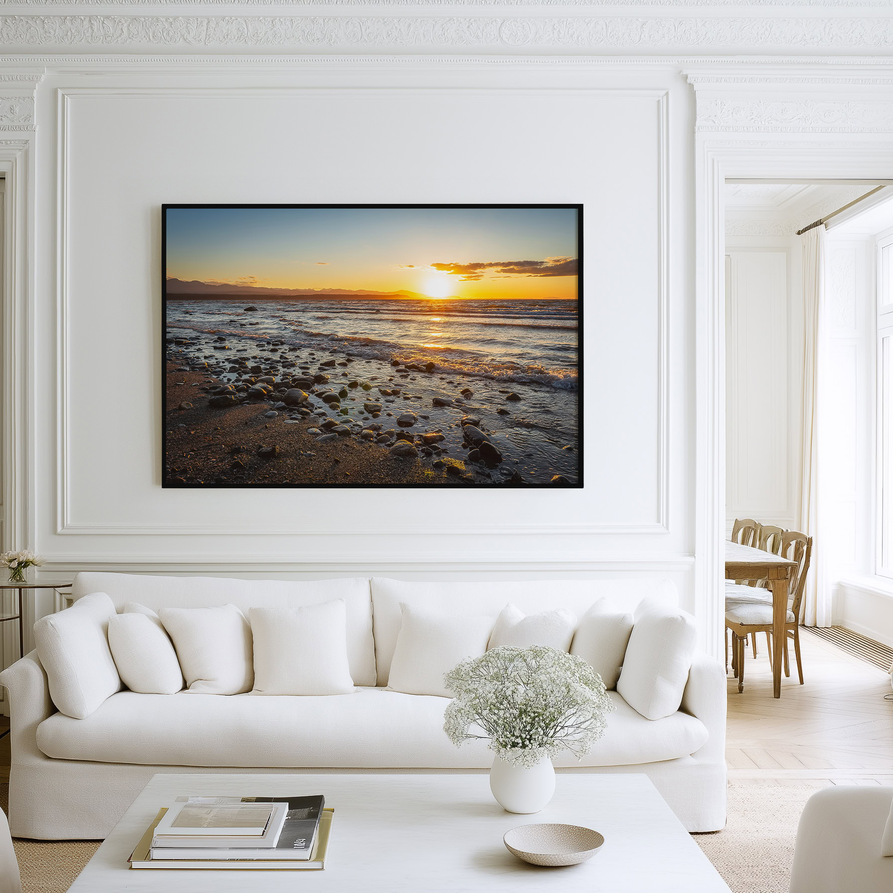 Fossil Beach Sun Over Vancouver Island print shown on the wall in a living room.