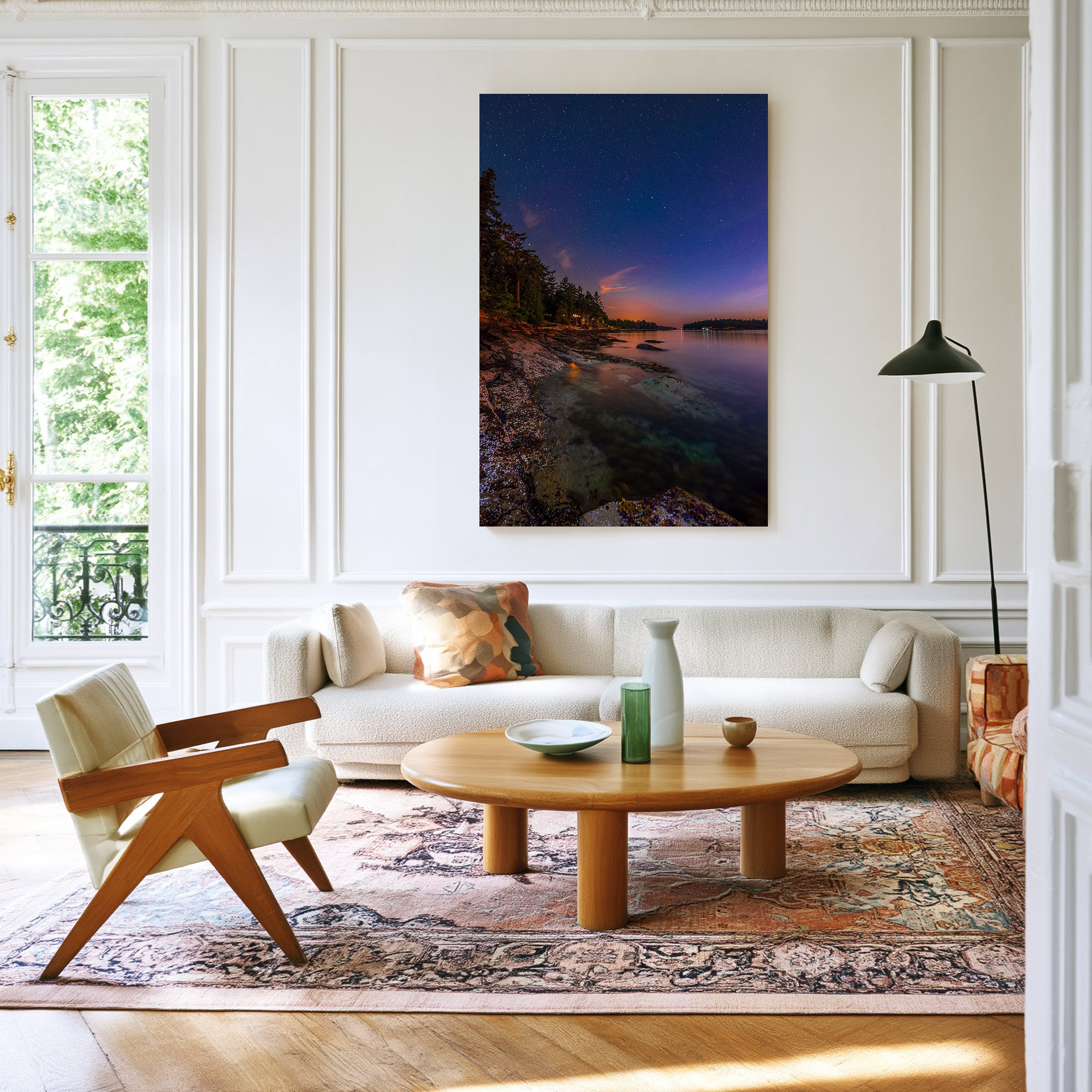 Galiano Island Shoreline Under the Stars print shown on the wall in a living room.