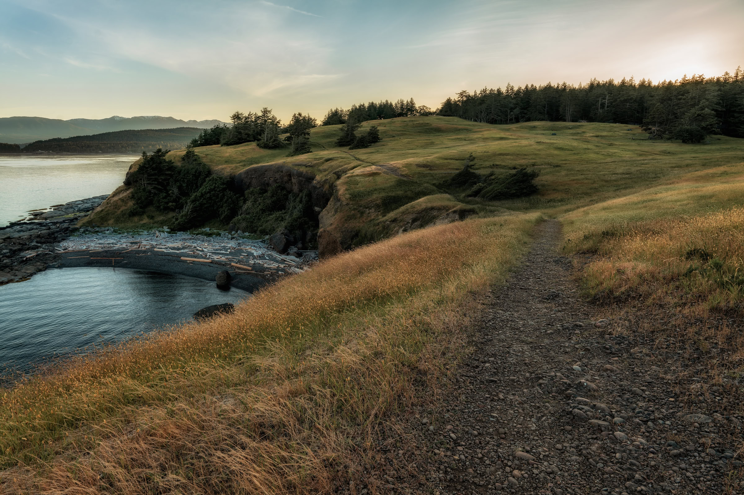 Helliwell Provincial Park wall art showing a bluff path in evening light above a driftwood cove, Hornby Island, BC, by James Wheeler.