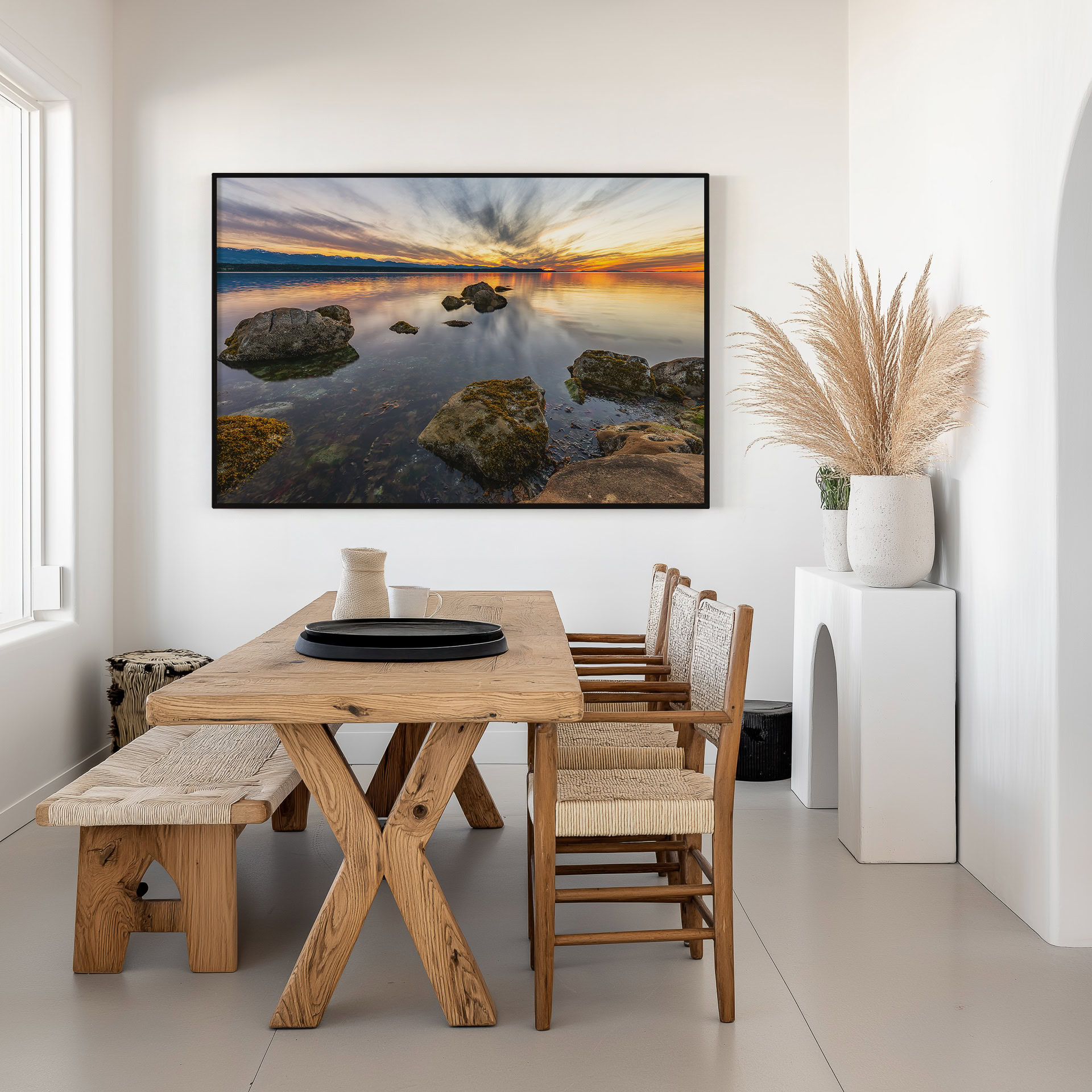 Hornby Island Evening Reflection print shown on the wall in a dining room.