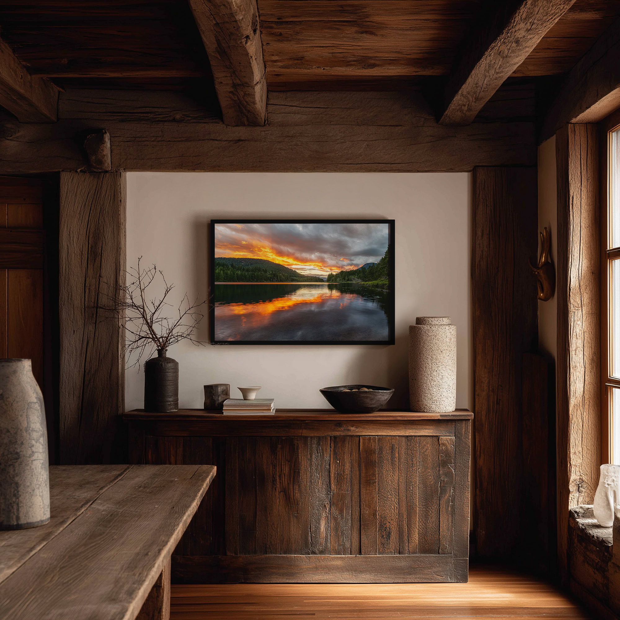 Inland Lake Clouds Catch Fire print shown on the wall in a styled room.