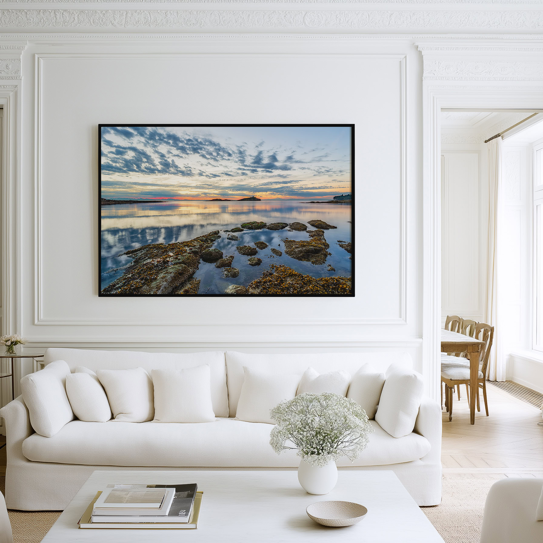 Morning Beach Sunrise on Galiano Island print shown on the wall in a living room.