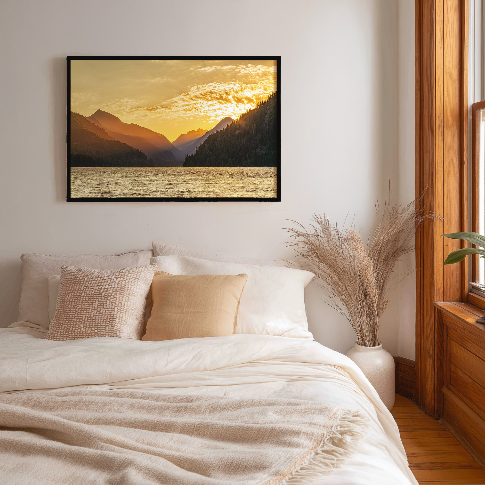 Muchalat Lake Sunset print shown on the wall in a bedroom.