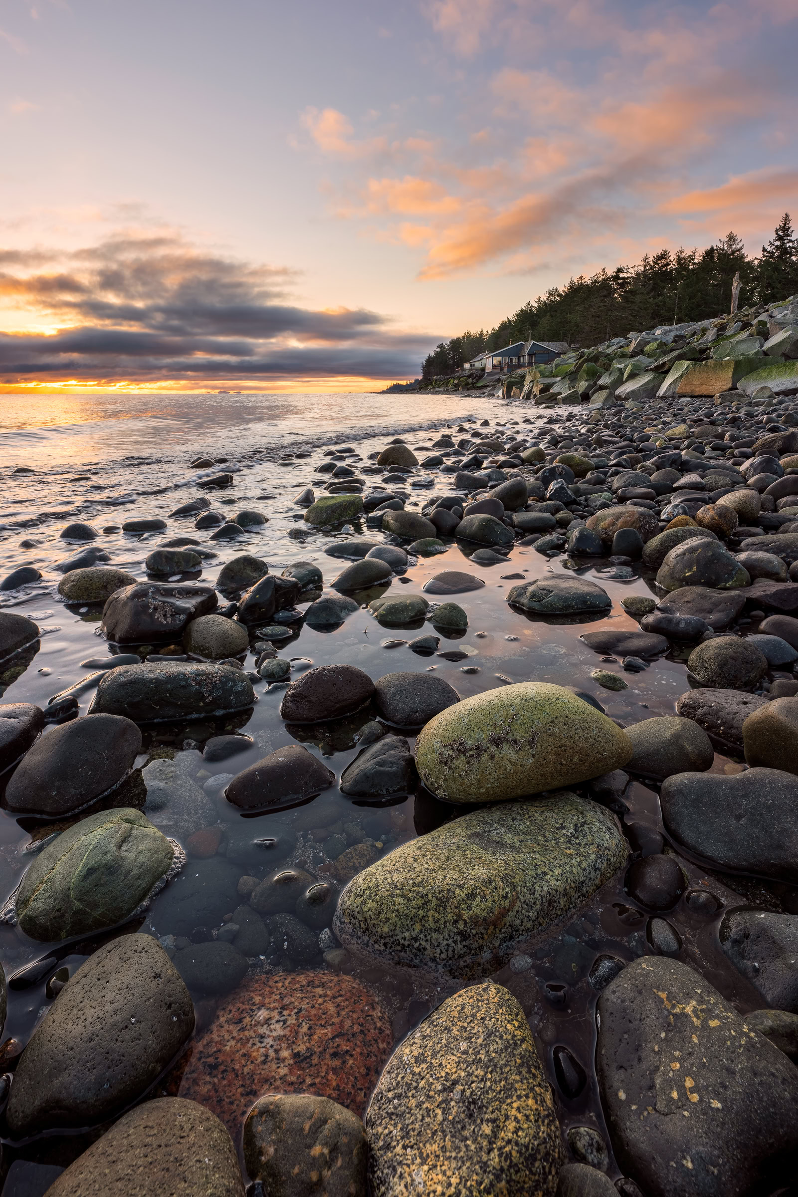Kin Beach Provincial Park wall art showing painted foreground rocks at sunrise on a winter morning, Comox Valley, BC, by James Wheeler.