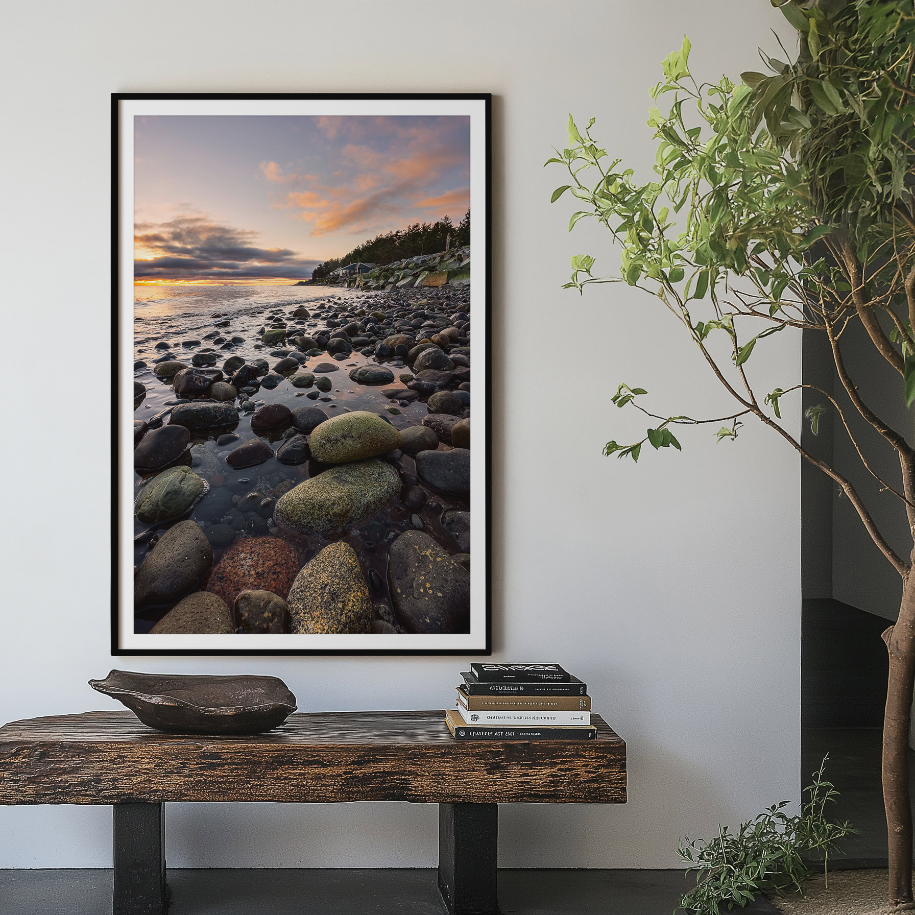 Painted Rocks at Kin Beach print shown on the wall in an entryway.