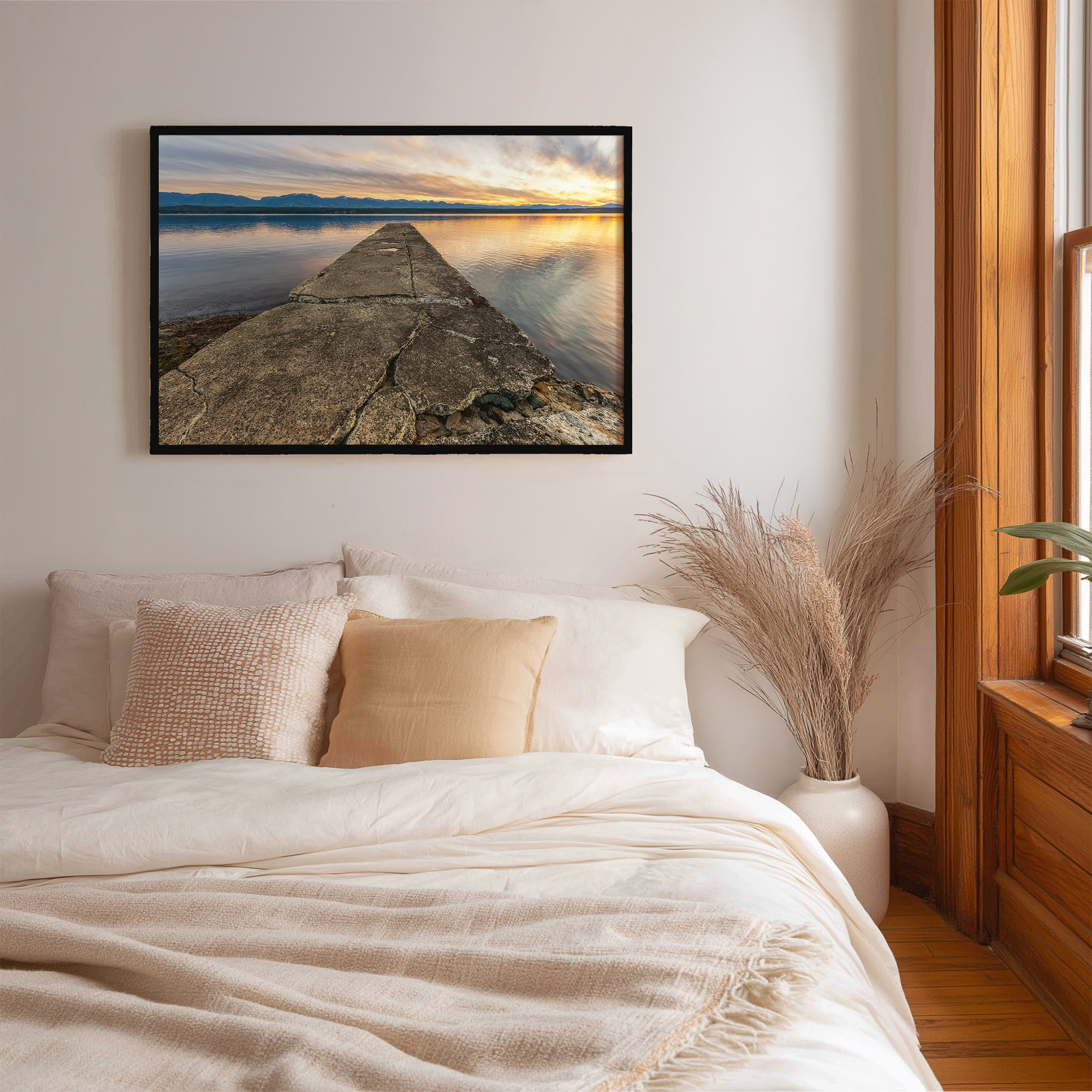 Phipps Point Pier print shown on the wall in a bedroom.