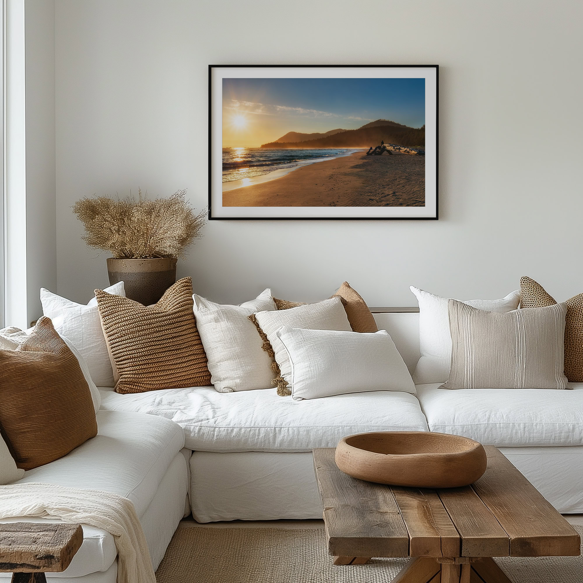 Raft Cove Beach at Sunset print shown on the wall in a living room.
