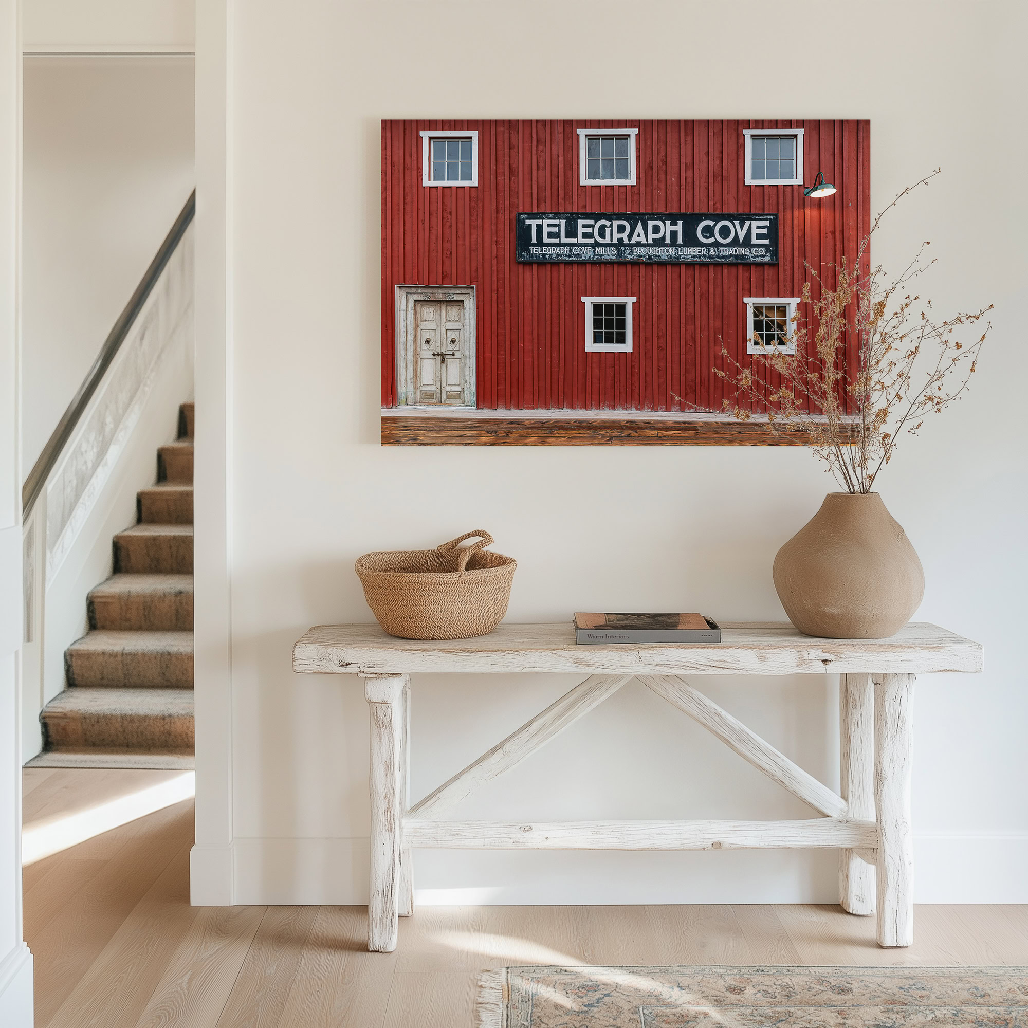 The Old Whale Museum at Telegraph Cove print shown on the wall in an entryway.