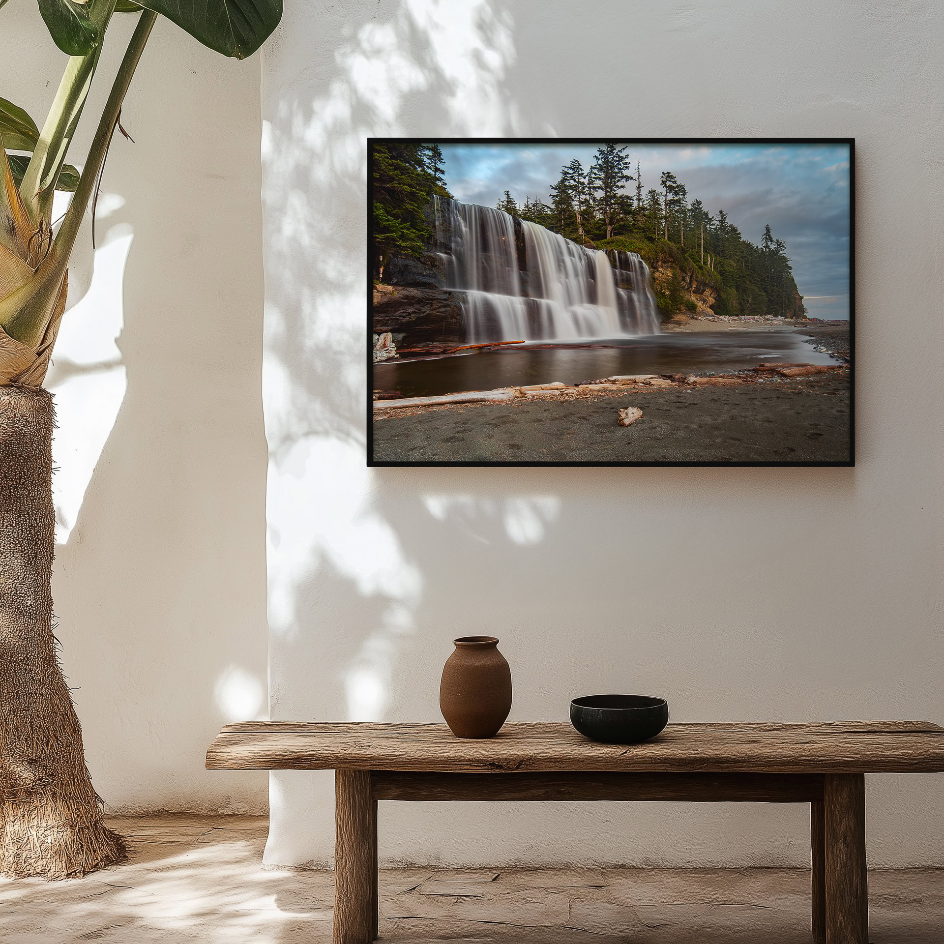 Tsusiat Falls on the West Coast Trail print shown on the wall in an entryway.