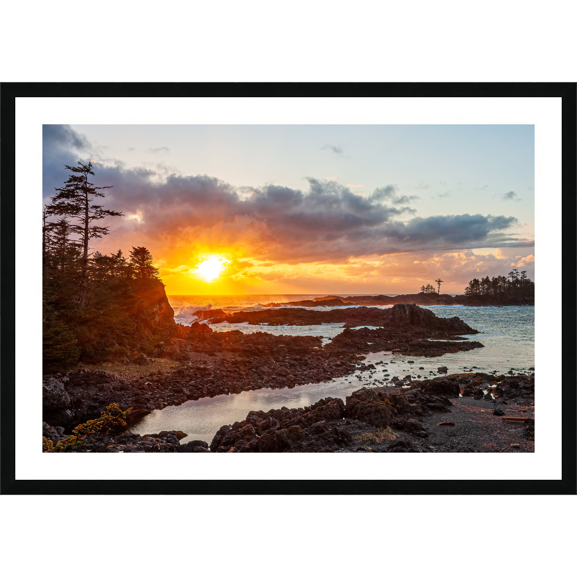 Ucluelet Sunset Through Breaking Clouds as a framed print.